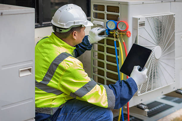 Professional Air Conditioning Repair technician working in Morganville, NJ